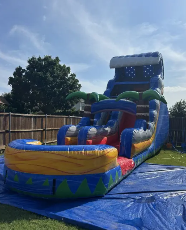 Tropical Fire Blast 18 foot water slide set up on a lawn