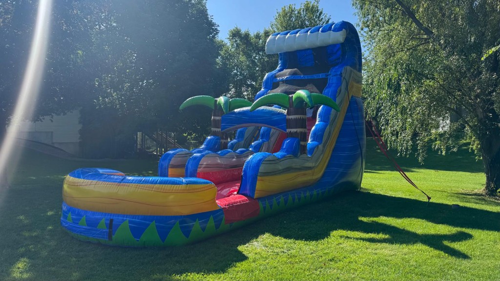 Tropical Fire Blast 18 foot water slide set up on a lawn